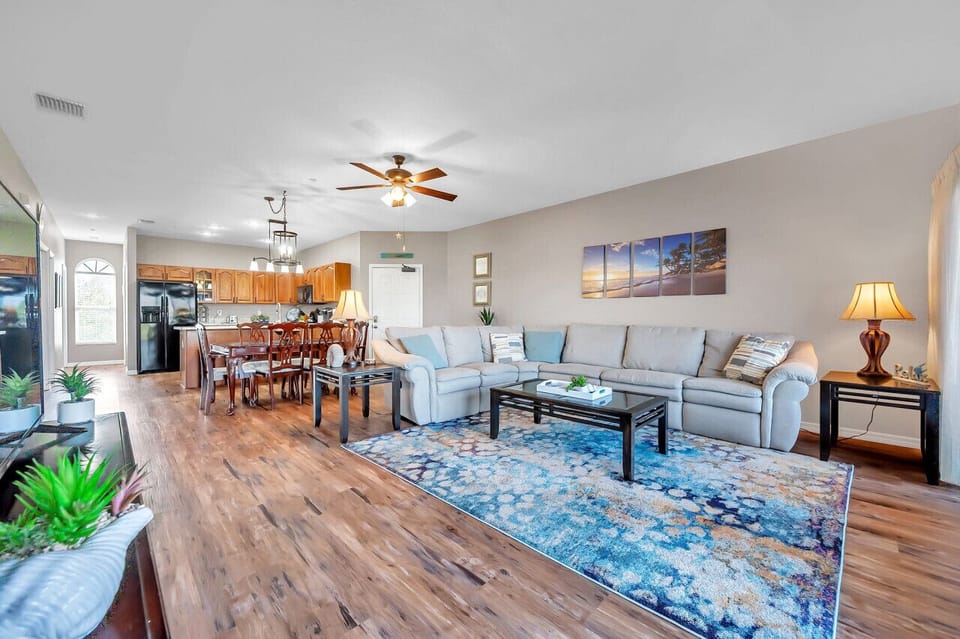 Open-concept living & dining space designed for relaxing together after a day out.