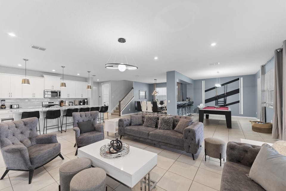 Step into luxury! ✨ This stunning open-concept living room combines elegance and comfort for the ultimate stylish retreat