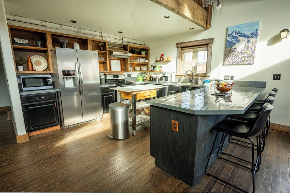 Relax in the cozy TV room, where rustic charm meets comfort. 