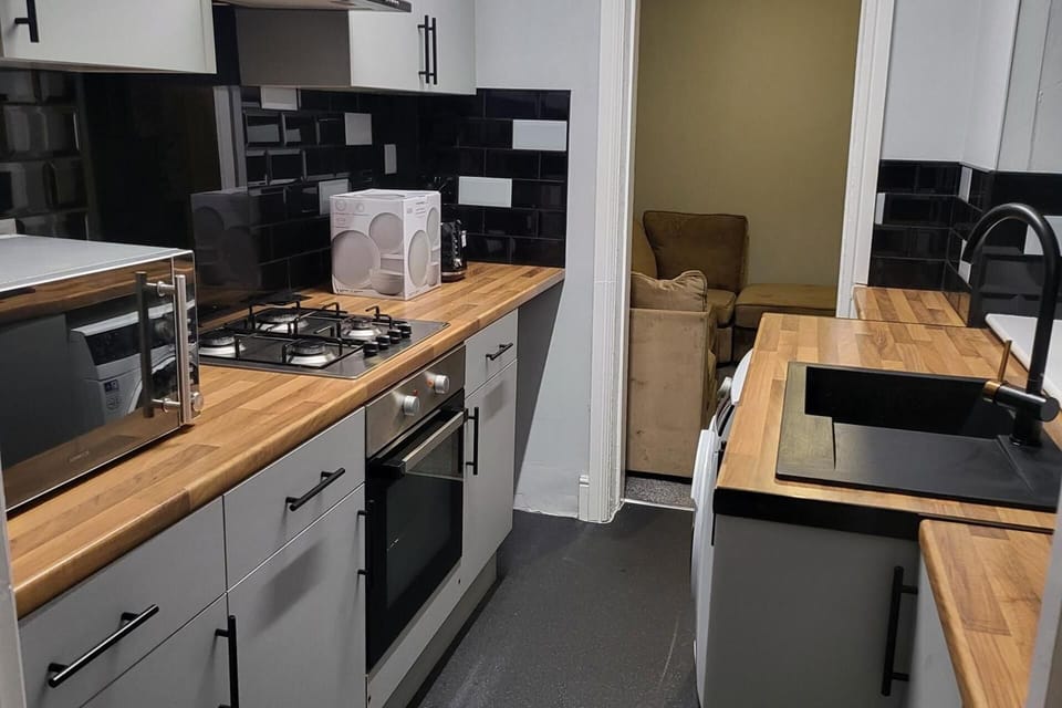 Apartment | Private kitchen | Fridge, microwave, oven, stovetop