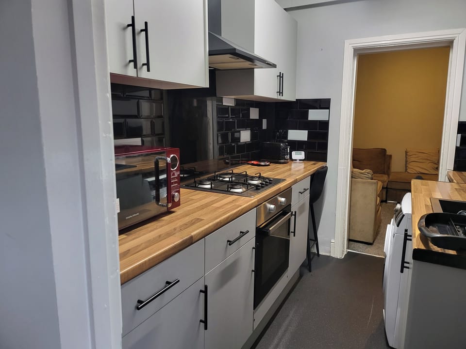Apartment | Private kitchen | Fridge, microwave, oven, stovetop