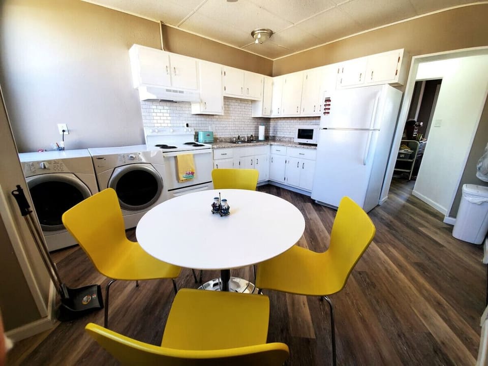 Dine-in kitchen with front load washer/ dryer