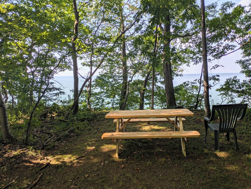 picnic table with a view of the lake 
