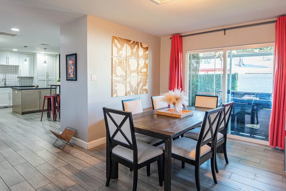 Stylish open layout with 6-seat dining and backyard views. Perfect for groups.
