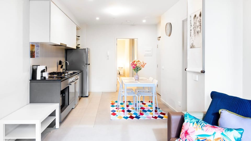 Seamless living: Dine, unwind, and create in our open-plan space with kitchen and living room