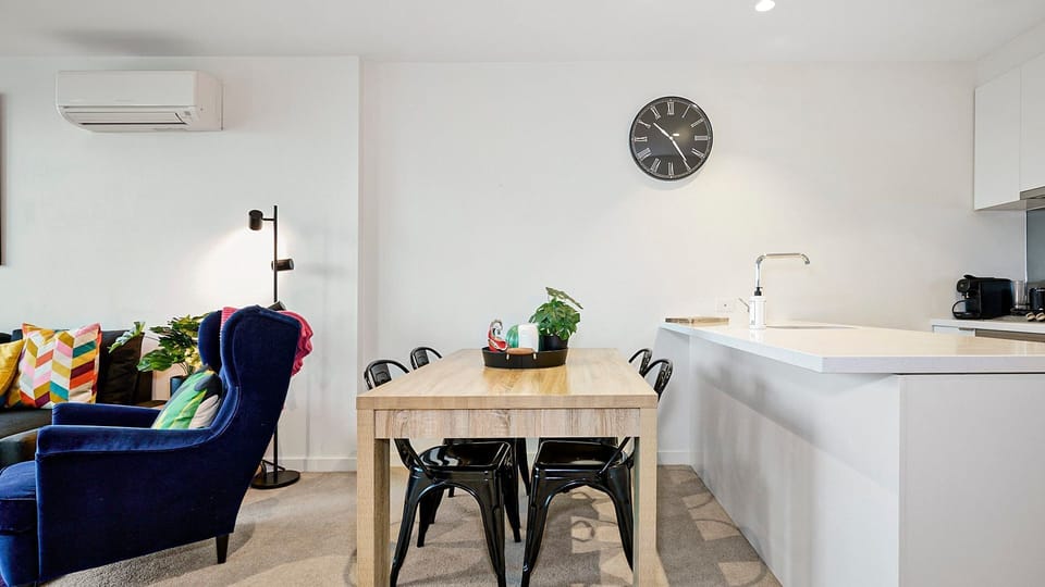 Open living and dining design with seamless flow for comfortable apartment living.