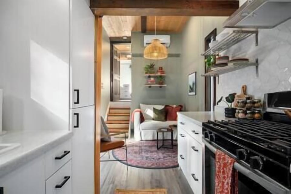 Kitchen flows nicely to living room.