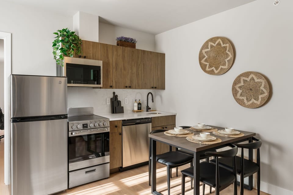 ADA Suite, 1 King Bed with Sofa bed, Non Smoking, Kitchen | Private kitchen | Full-size fridge, microwave, oven, stovetop