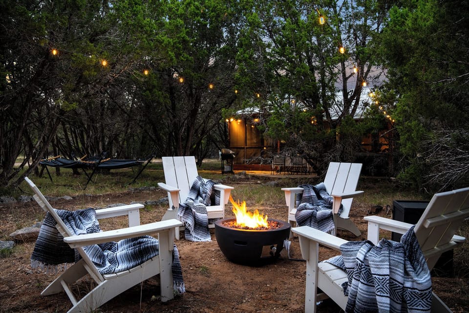Cozy up by the fire pit—perfect for s'mores, stargazing, and making memories.