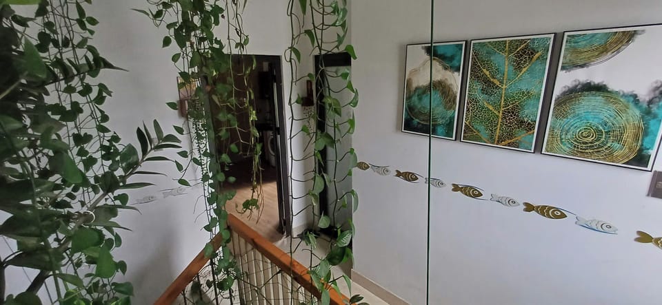 its very greenery, airy corridor with windows up to terrace, entrance each room.