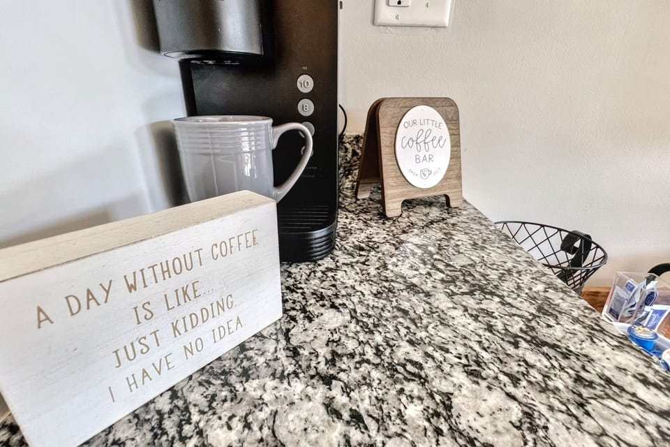 Coffee comforts: a keurig and an automatic drip pot for your preference. 