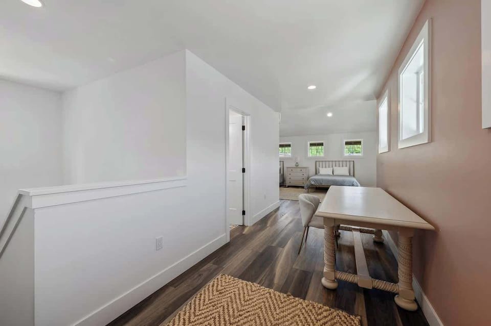 Loft workspace with desk and chair—ideal for remote work or planning your next adventure.
