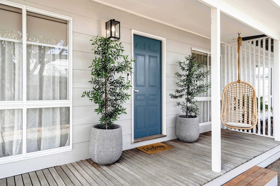 Whether you’re lounging by the fire or enjoying the swinging chair, this home invites you to unwind and make lasting memories by the sea