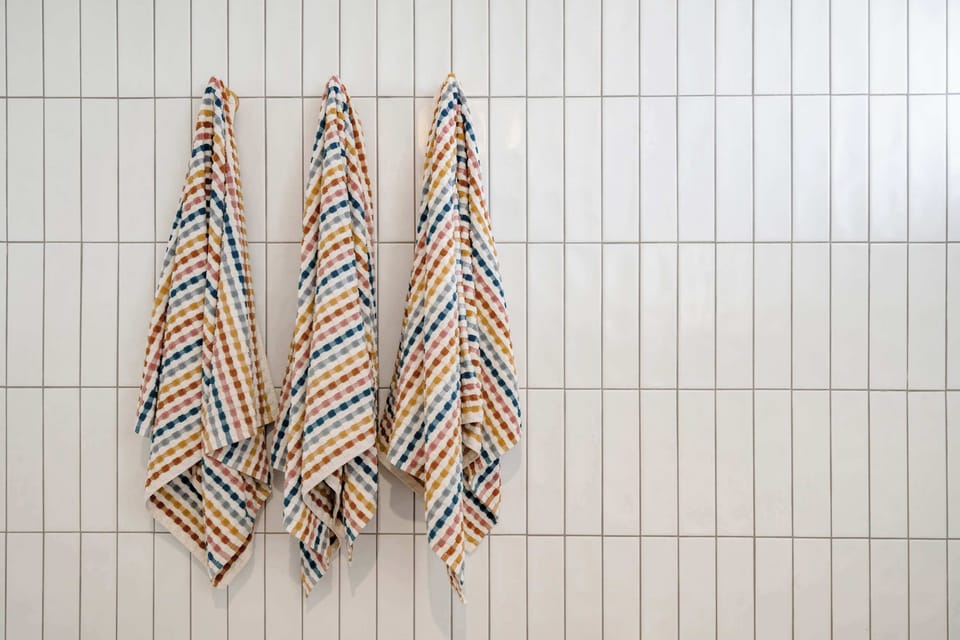 The bathroom offer luxurious amenities, perfect for unwinding after a day at the beach