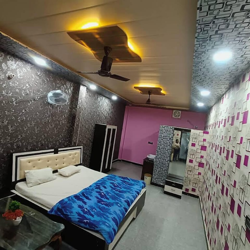 Deluxe Room, Balcony, City View | Desk, bed sheets