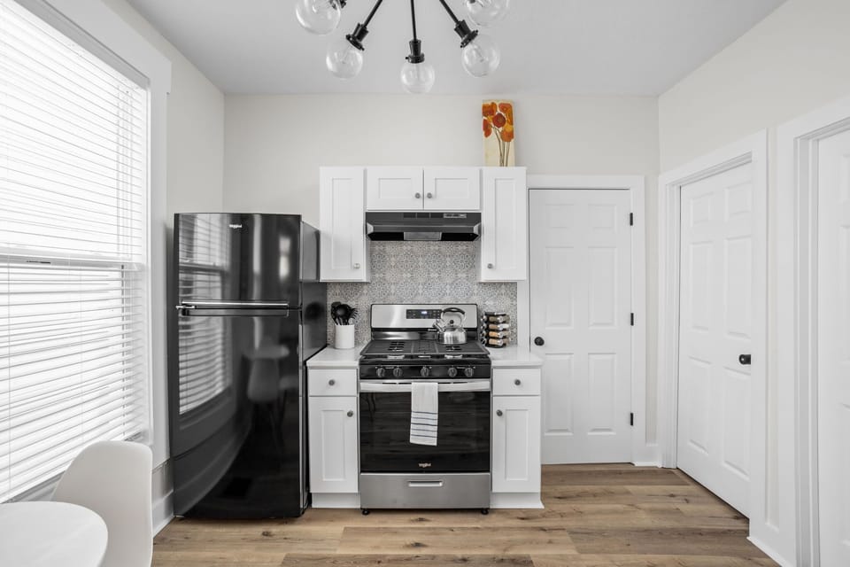 Kitchen: Stylish space with modern appliances and unique decor for delicious culinary adventures!