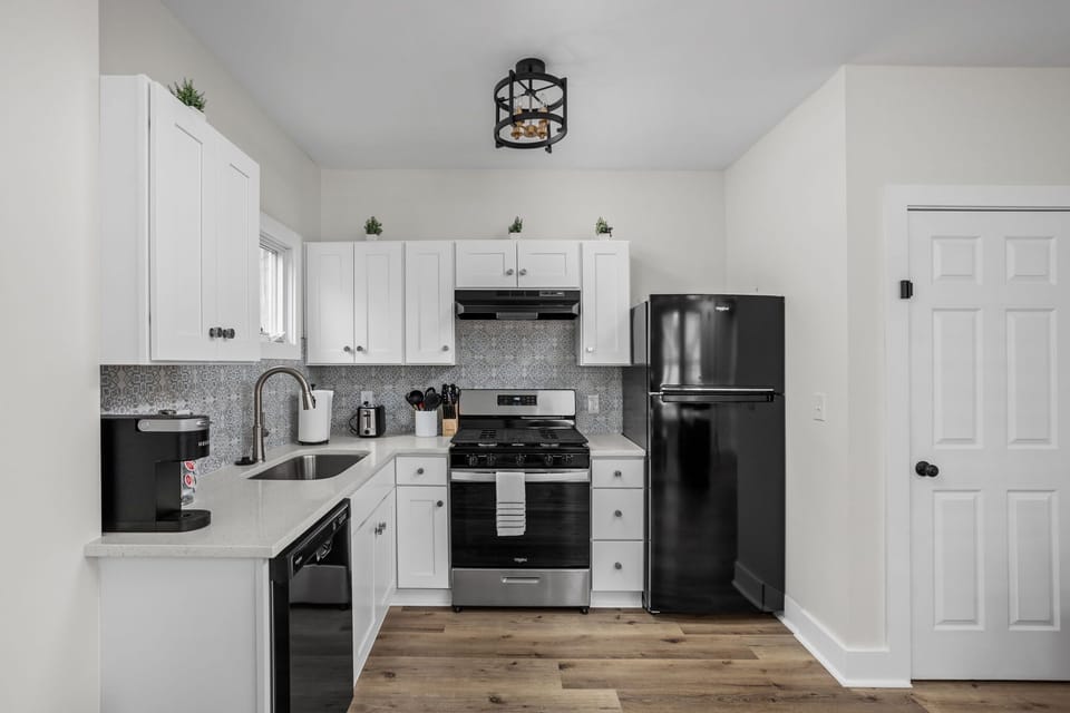 Kitchen: Whip up culinary delights in this chic space with modern appliances and stylish decor!