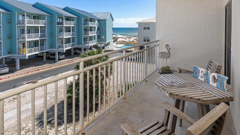 Condo, Multiple Beds, Balcony, Partial Ocean View (Sugar Beach 223) | Outdoor dining