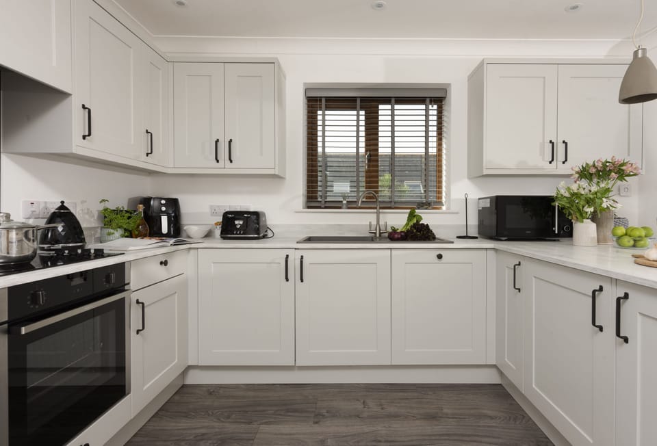 St Andrews, Polzeath. First floor: The sleek kitchen area provides everything you'll need during your stay