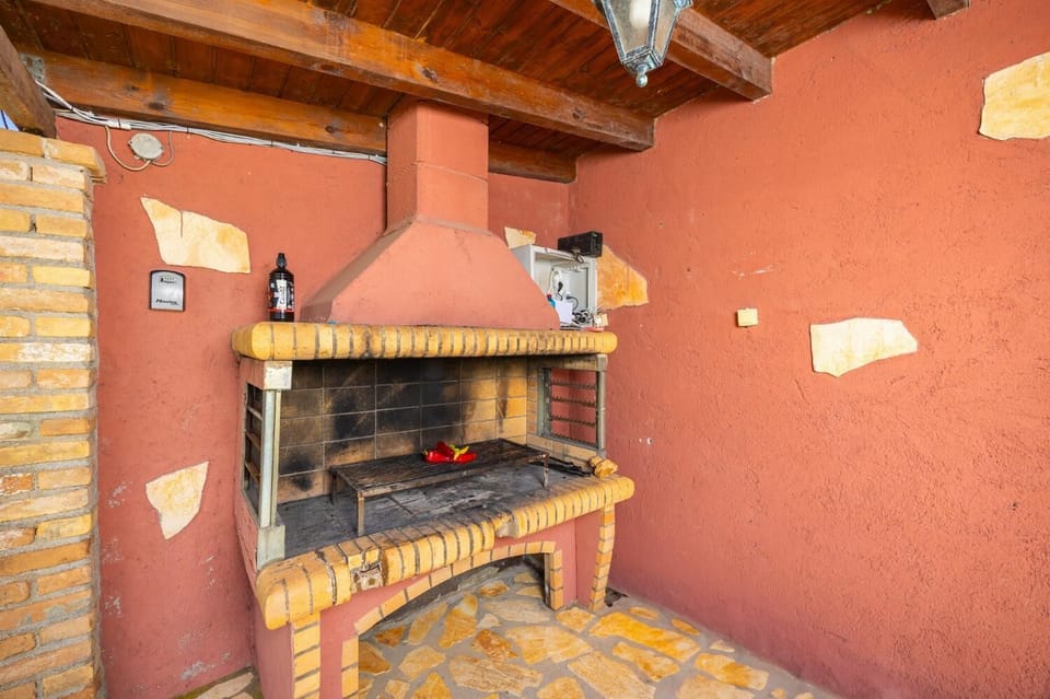 Sheltered terrace area with BBQ
