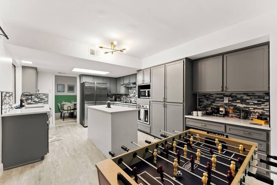 Gather around the foosball table for some lively competition, then head to the fully equipped kitchen to whip up delicious meals and snacks together!