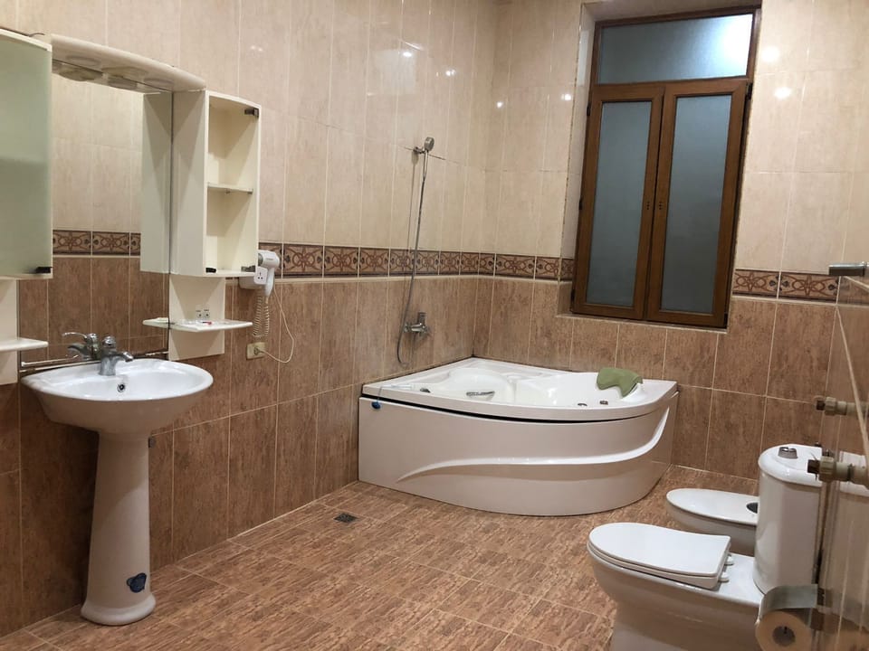 Comfort Room, City View | Bathroom | Hair dryer, towels, soap, shampoo