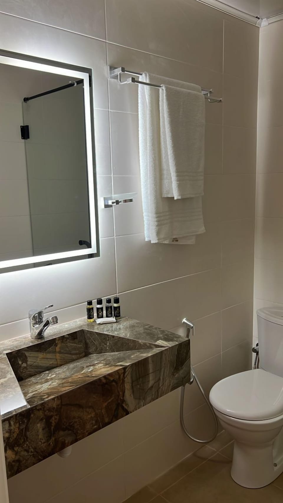 Shower, slippers, towels, soap