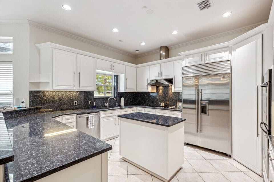 High end appliances and a prep island - cooking just became a little more convenient.