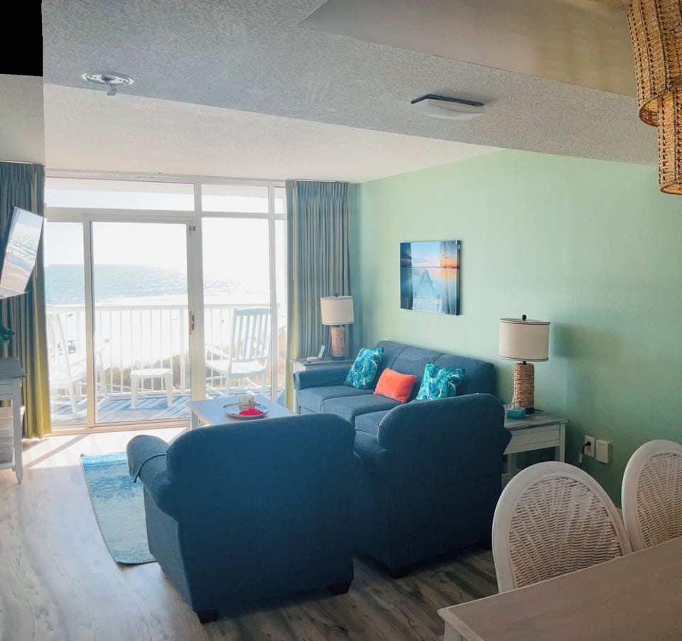Condo, Balcony, Ocean View | Living area | Flat-screen TV
