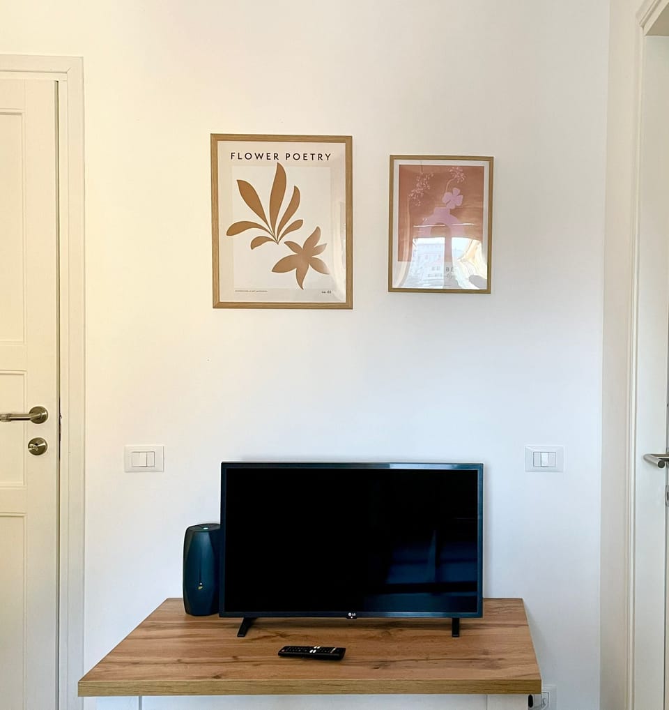 Rome Suite | Living area | 55-inch Smart TV with digital channels