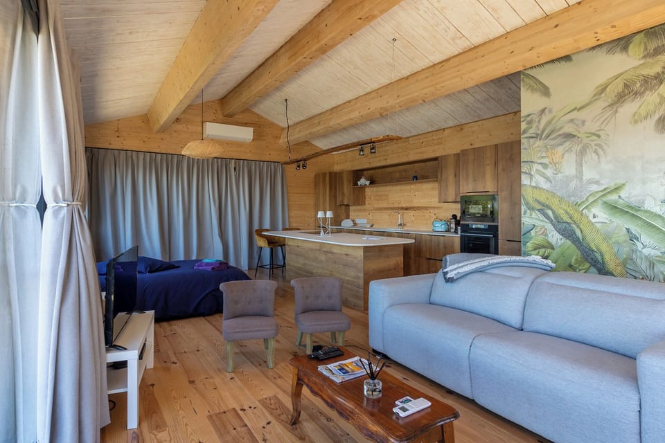 Comfort Villa, Sea View | Living area | Flat-screen TV