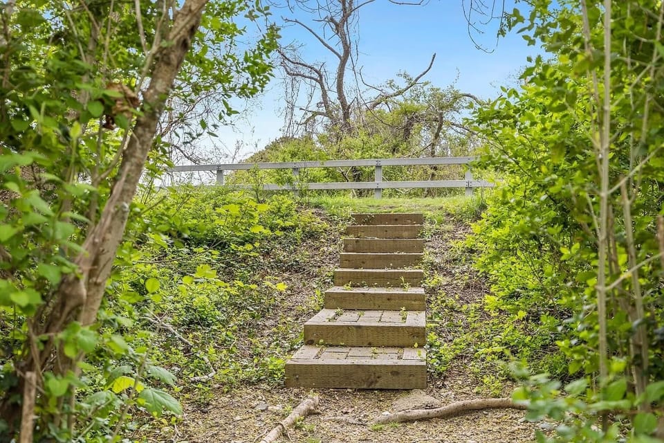 stairs on property to the bike path
