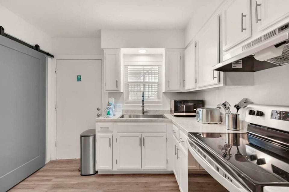 Indulge in preparing your favorite meals in this fully equipped kitchen, stocked with all the necessary tools for culinary creations