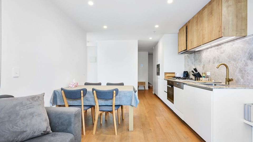 Open plan dining and kitchen filled with natural light