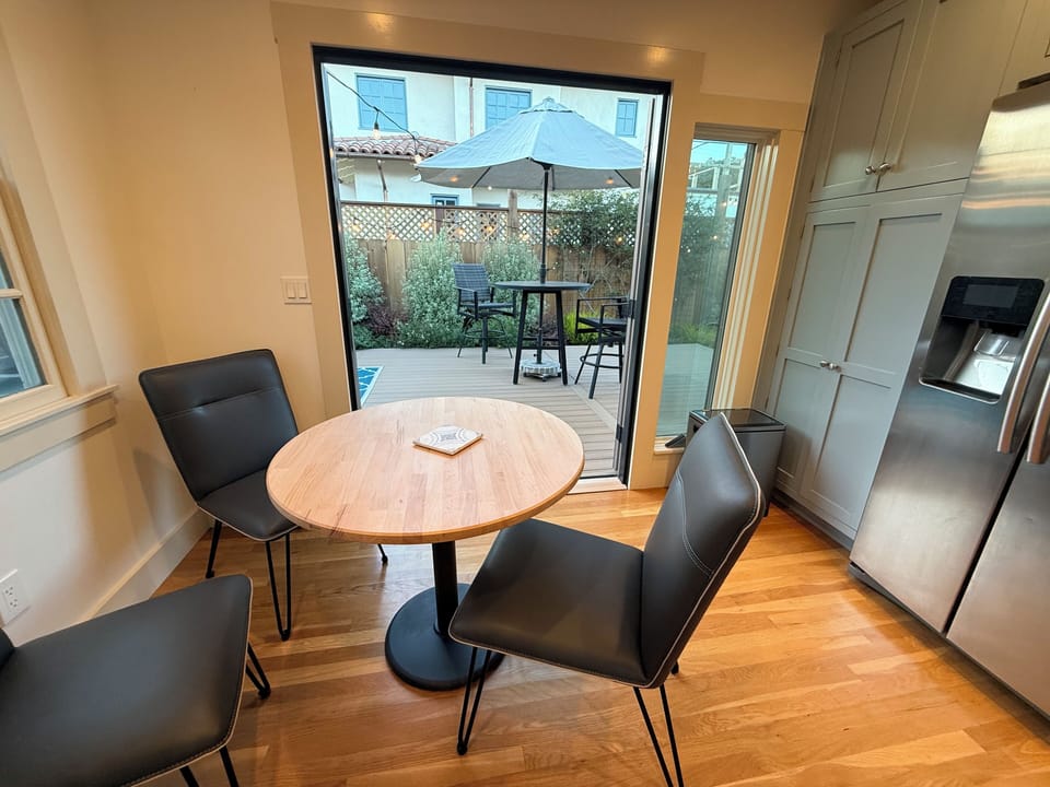 French door open to the spacious deck.