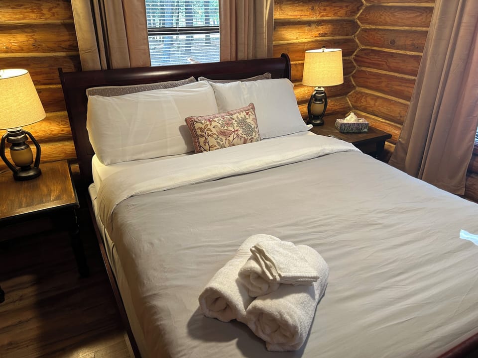 Master bedroom is so cozy with very comfortable bedding and mattress. T.V. Too!