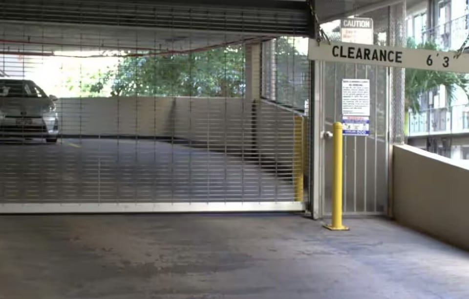 buildings onsite parking structure.  The clearance is 6'3.  1 parking included 