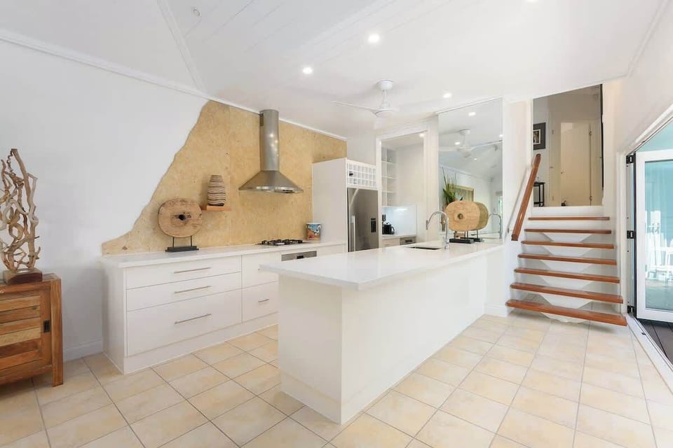 Open, beautifully equipped kitchen featuring contemporary appliances 