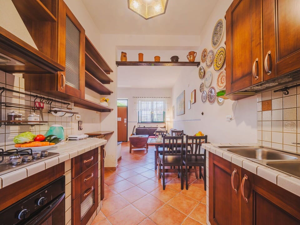 Cabinetry, Furniture, Countertop, Table, Wood, Building, Lighting, Kitchen, Orange, Interior Design