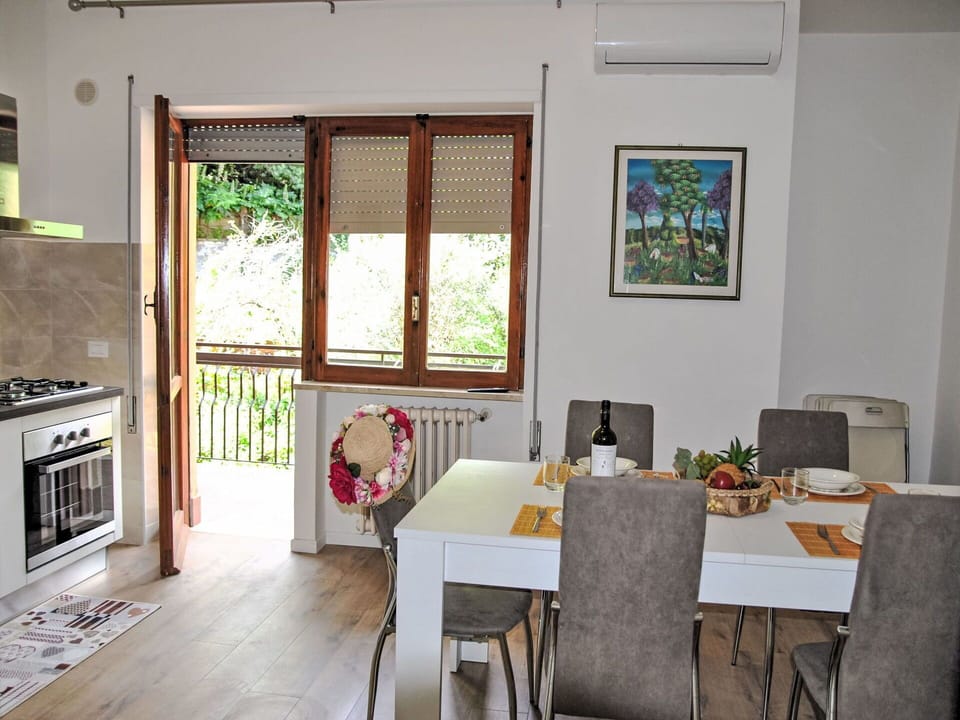 Furniture, Property, Table, Window, Chair, Interior Design, Gas Stove, Wood, Kitchen Stove, Kitchen Appliance