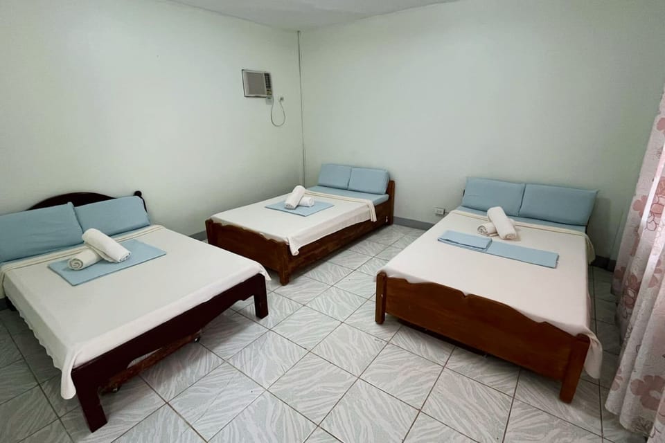Family Room | Desk, bed sheets