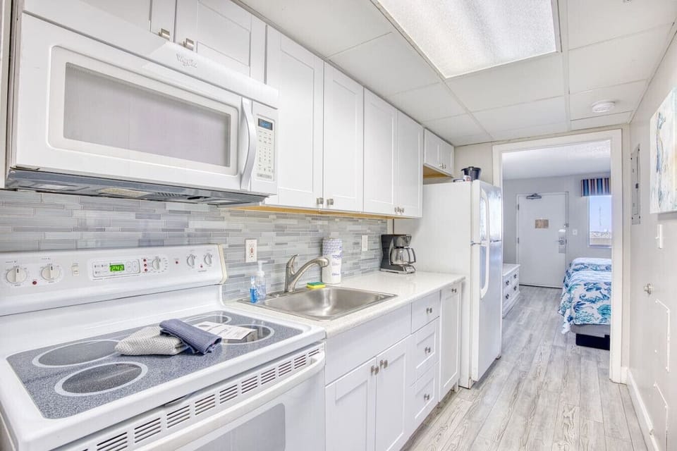 Kitchen Haven: Modern appliances and stylish decor set the stage for culinary adventures!