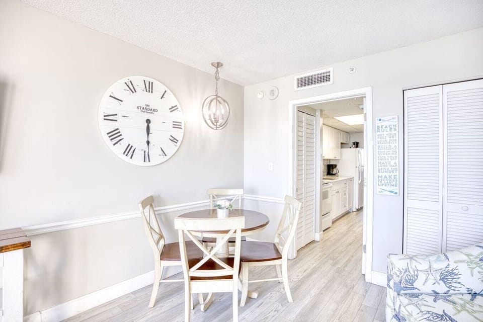 Dining Area: Gather around for tasty meals and unforgettable game nights in this delightful space!