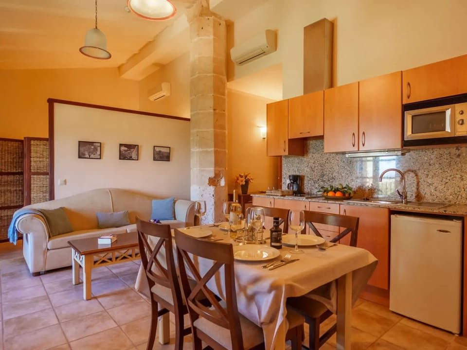Family Apartment | Private kitchen | Coffee/tea maker, highchair