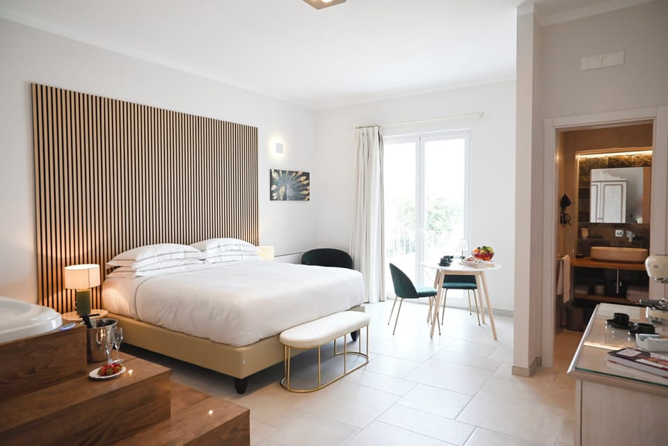 Standard Suite, Balcony, City View | 1 bedroom, minibar, in-room safe, desk