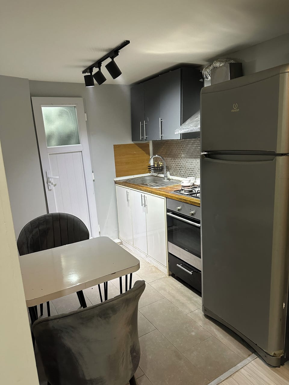 Deluxe Quadruple Room, Balcony, City View | Private kitchen | Coffee/tea maker, electric kettle