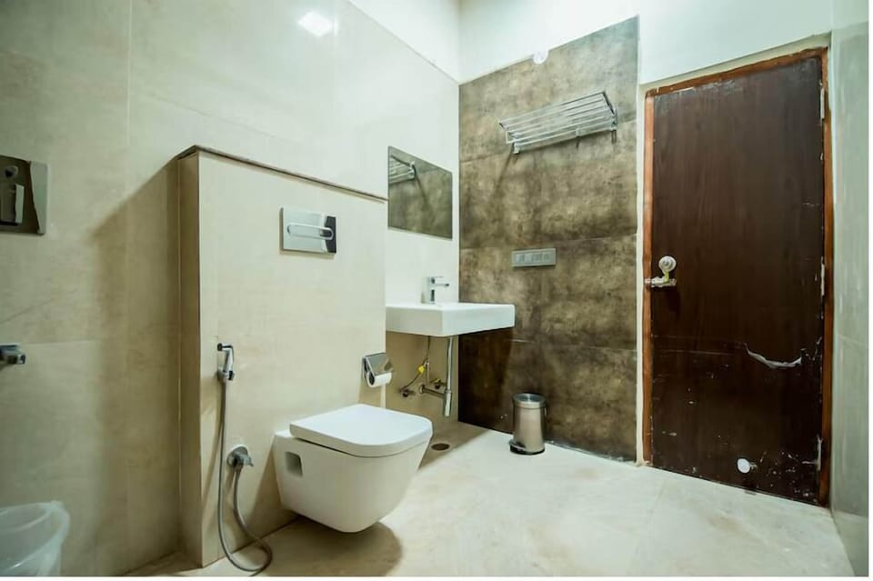 Deluxe Double Room, Garden View | Bathroom | Shower, slippers, towels, soap