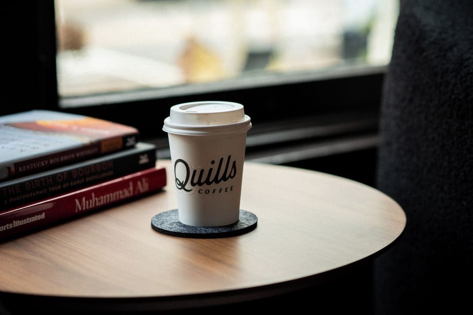 Enjoy local coffee and street activity from swivel chairs in the front window!