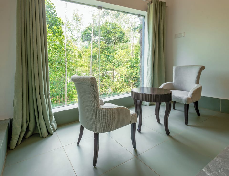 Suite, Balcony, Garden View | Living area | TV