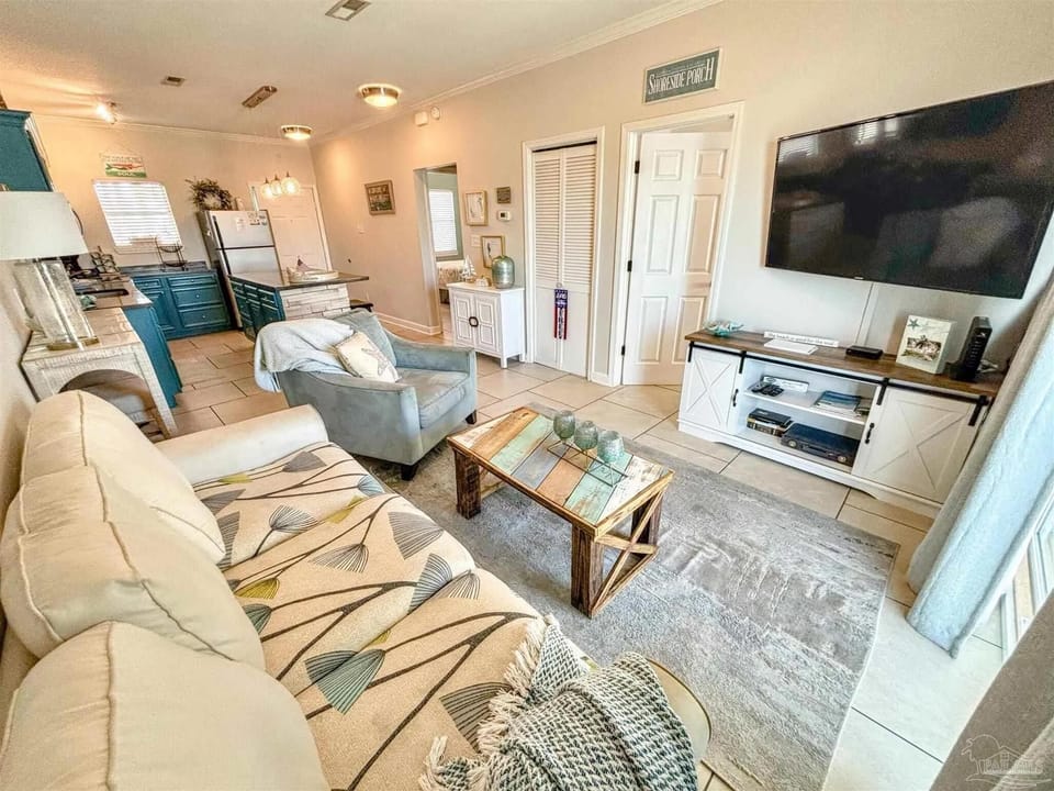 Condo, Multiple Beds (Baywatch E3) | Living area | TV